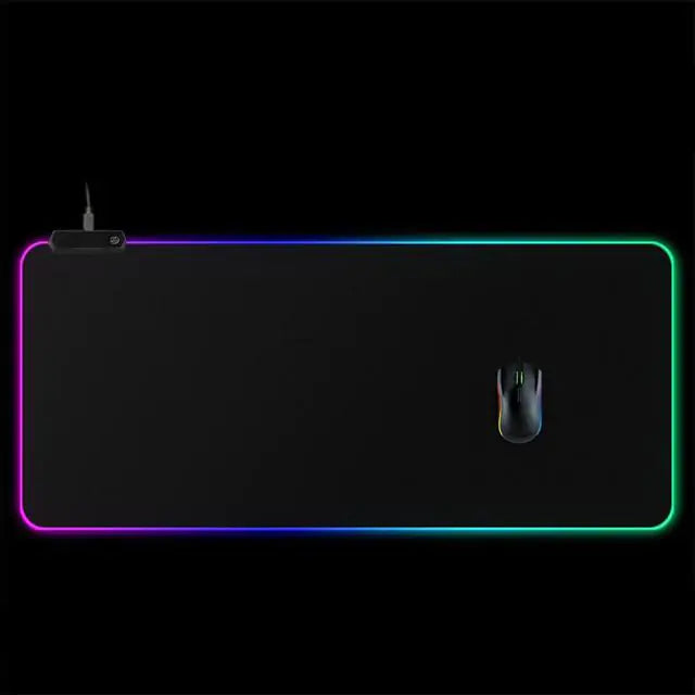 Symphony RGB desk mat with multicolor LED lighting and a black gaming mouse on top