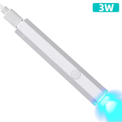 White compact nail lamp for travel emitting blue light with USB charging port and power button