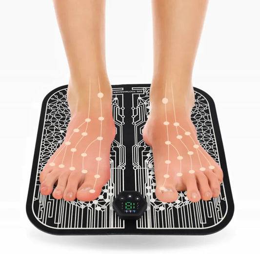 EMS foot stimulation pad with a digital display and two feet placed on it for muscle relief therapy