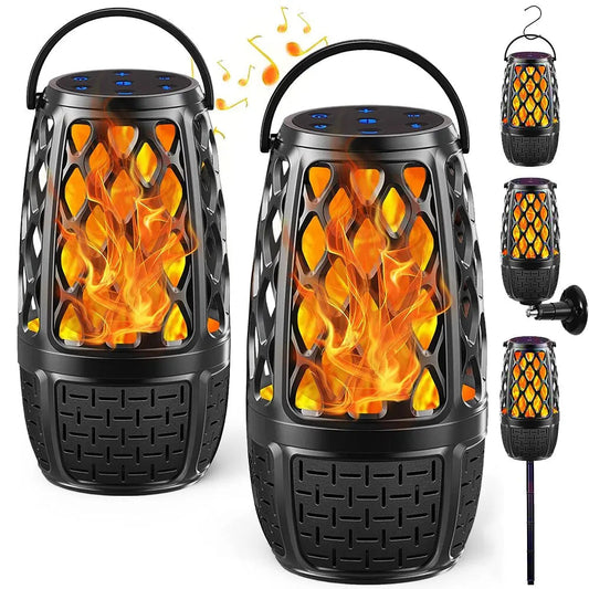 Portable flame bluetooth speaker with realistic fire effect and black handle for outdoor use