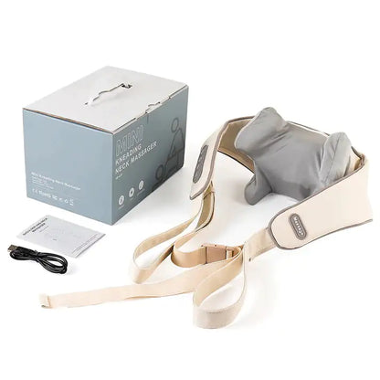 Portable shoulder massager with heat in beige and gray with packaging, remote, and charging cable