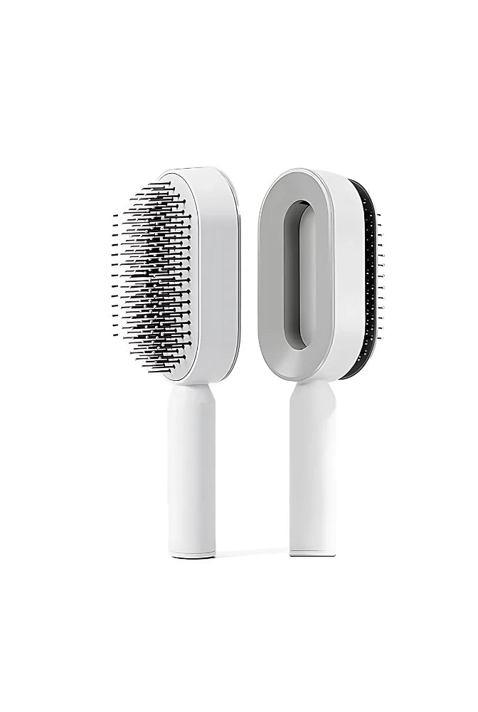 White self-cleaning hair brush with ergonomic handle shown from front and back views