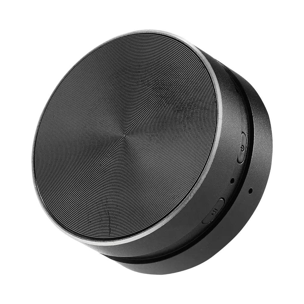 Black portable conduction speaker with circular design and control buttons on side