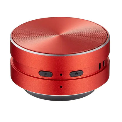 Red portable conduction speaker with compact round design and black control buttons